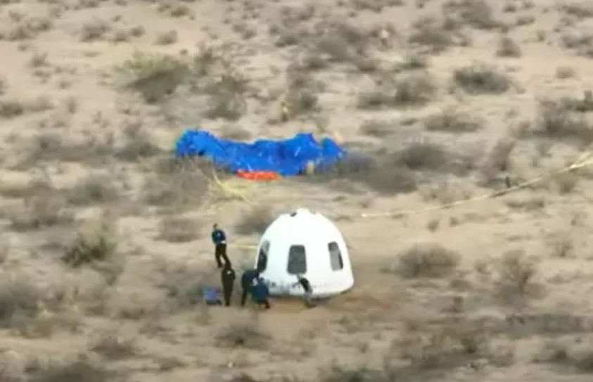 Moment Jeff Bezos faceplants into dirt while trying to greet fiancée and crew after Blue Origin space flight