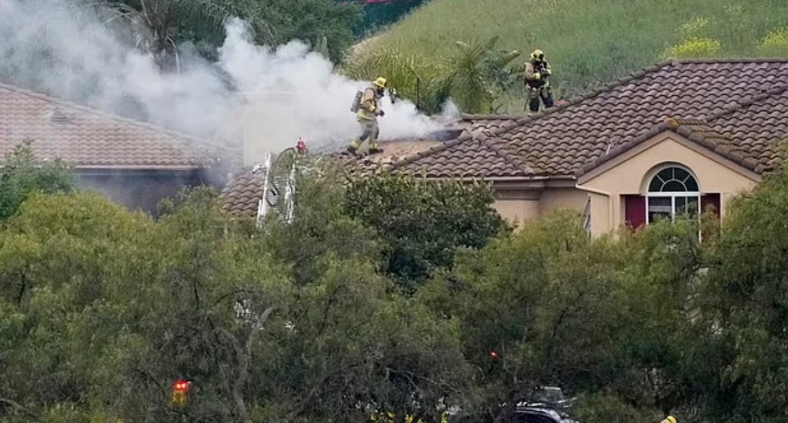 Small plane crashes into California neighborhood, killing two people and a dog