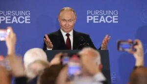 Reason why Putin made rare four-word comment to Trump in English, explained by body language expert