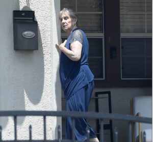 Famed actress spotted on rare outing in LA -can you guess who she is?